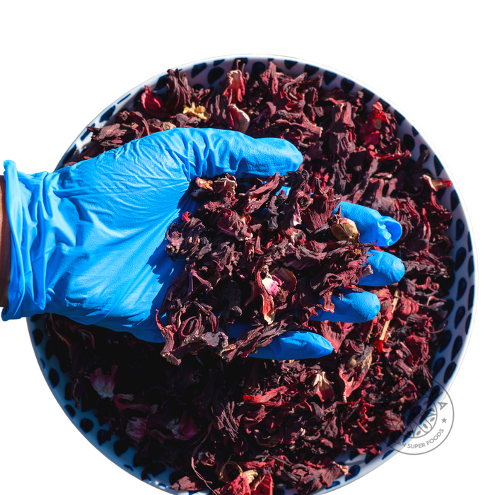 Loose leaf dried hibiscus flowers, sold in a 15 lb bulk wholesale box